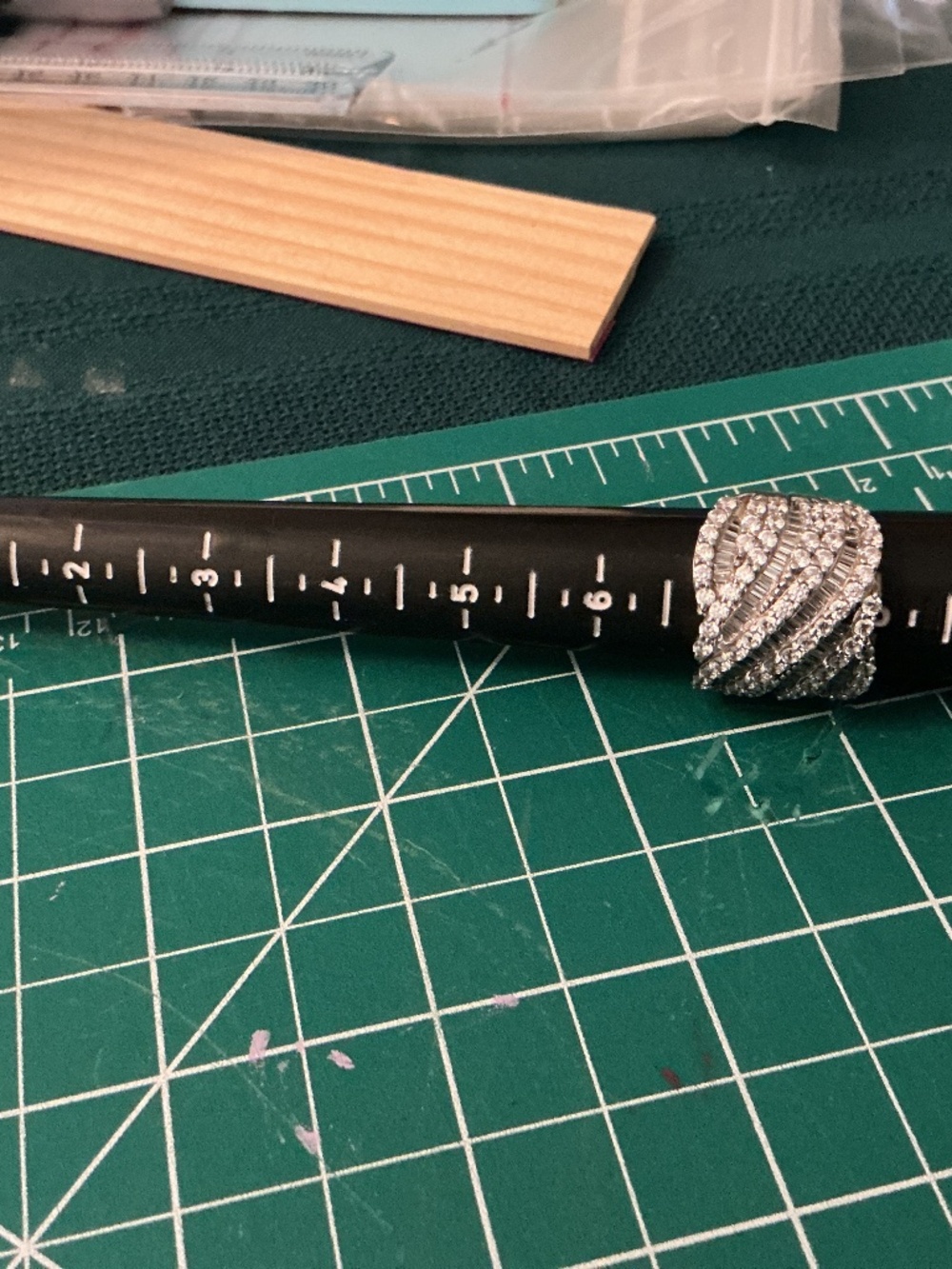 JTV ring size 7. with CZ baguettes and CZ diamonds.